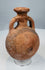 Front view of miniature Cypriot terracotta flask with everted rim and loop handles