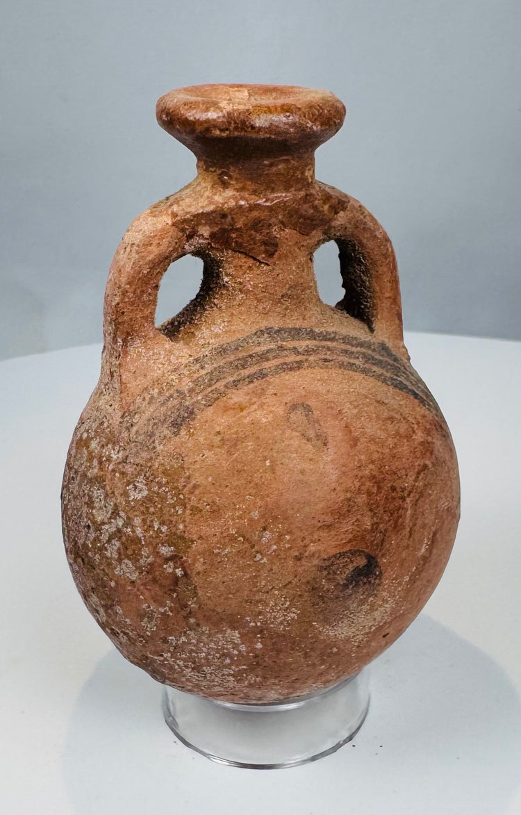Front view of miniature Cypriot terracotta flask with everted rim and loop handles