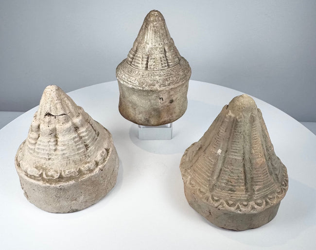 Ancient Buddhist miniature clay stupas with moulded ribs and decorative architectural bands