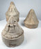 Early medieval Indian Buddhist votive stupas with natural wear, mineral accretions, and moulded decoration