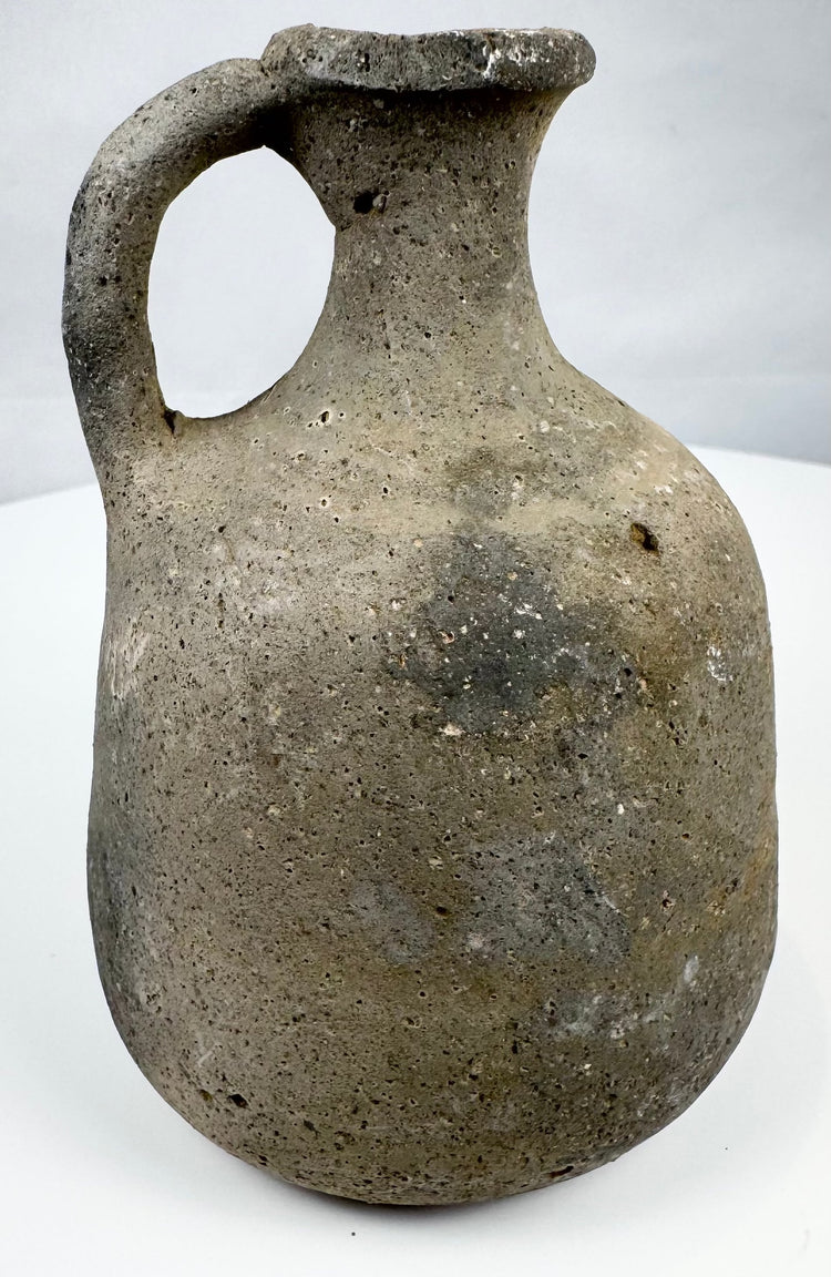 Eastern Mediterranean pottery jug with narrow neck and thick flared rim