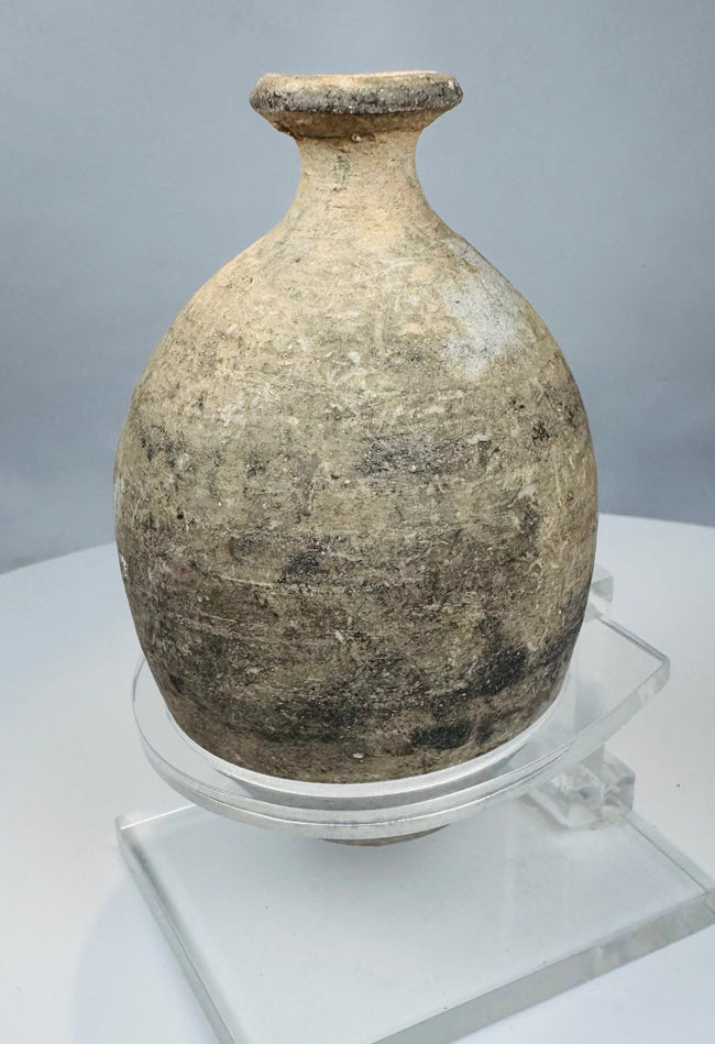 Eastern Mediterranean ceramic flask with narrow neck and pale burial accretions