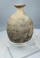 Eastern Mediterranean ceramic flask with narrow neck and pale burial accretions