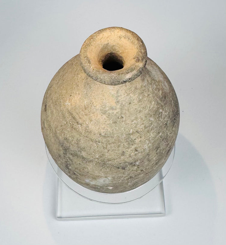 Wheel-made Eastern Mediterranean terracotta flask with mineral deposits and archaeological patina