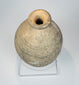 Wheel-made Eastern Mediterranean terracotta flask with mineral deposits and archaeological patina