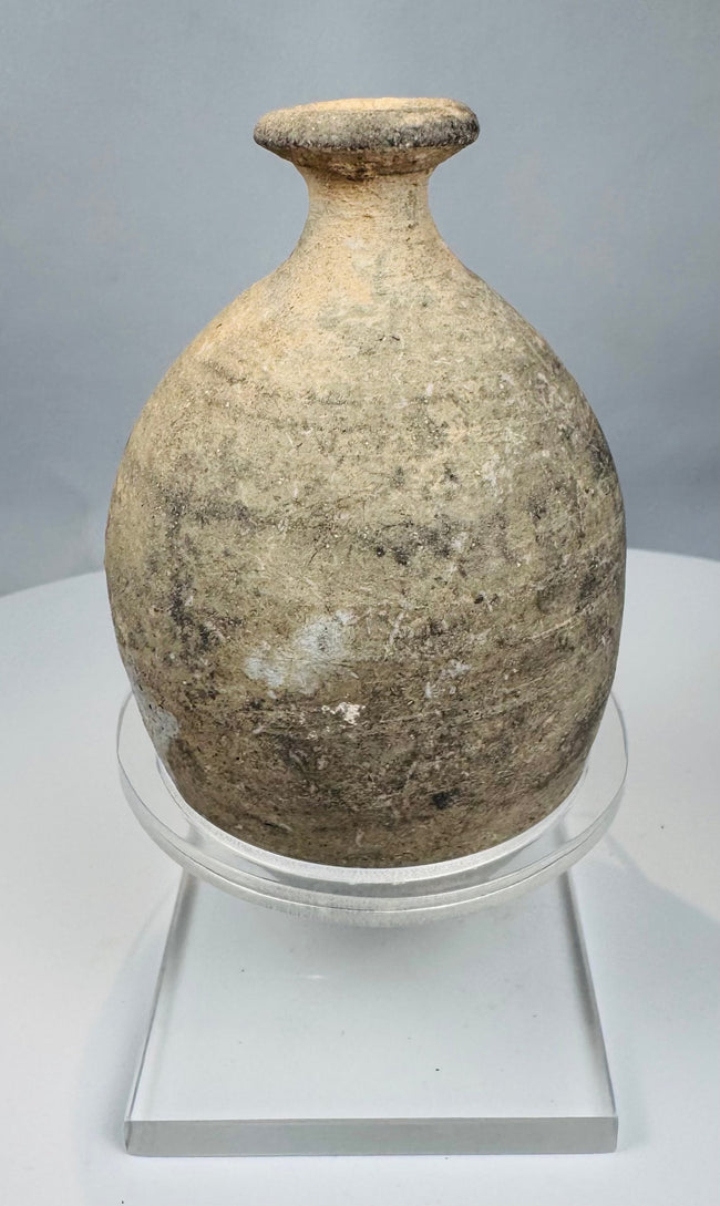 Close-up of everted rim and narrow opening on an ancient terracotta bottle