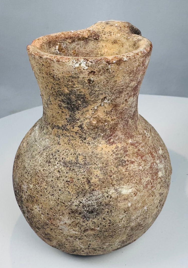Underside of Roman Byzantine terracotta vessel showing small circular base projection