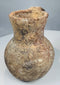 Underside of Roman Byzantine terracotta vessel showing small circular base projection
