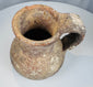 Small Roman or Byzantine terracotta jug with flared rim and large strap handle