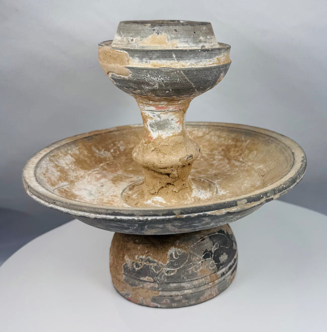 Museum-quality terracotta ritual vessel with pedestal base and architectural form