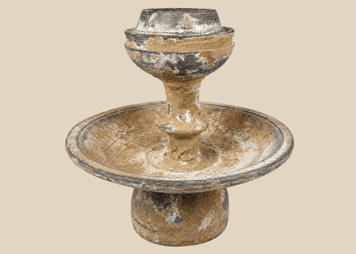 Ancient terracotta pedestal vessel with central cup and broad ceremonial basin