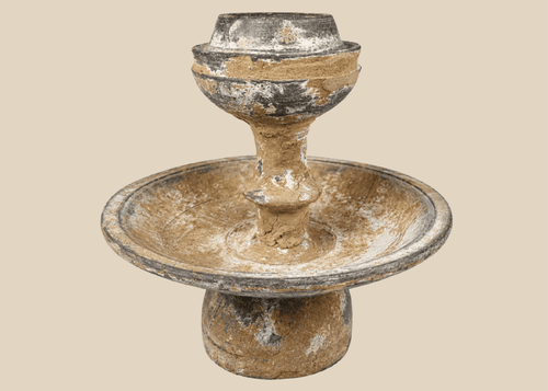 Ancient terracotta pedestal vessel with central cup and broad ceremonial basin