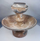 Near Eastern terracotta pedestal lamp or offering vessel with aged encrustation