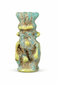 Ancient Egyptian Bes charm in glazed faience used as a protective talisman.