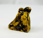 Late Period Egyptian falcon amulet symbolizing the sky god Horus.