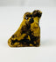Ancient Egyptian Horus falcon amulet worn as a protective charm in antiquity.