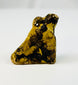 Ancient Egyptian Horus falcon amulet worn as a protective charm in antiquity.