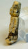 Ancient Egyptian devotional amulet with extensive glaze loss and authentic archaeological condition.