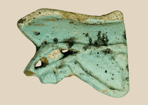 Ancient Egyptian faience Eye of Horus amulet fragment in blue-green glaze with burial patina