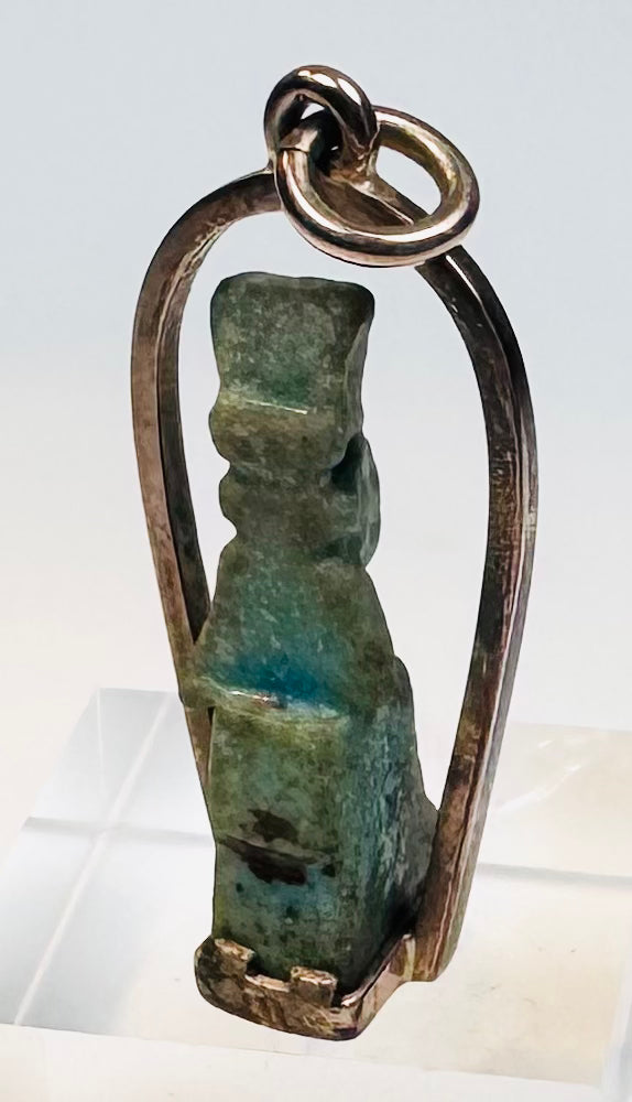 Blue-green Egyptian faience figure pendant dating to circa 664–30 BCE