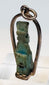 Blue-green Egyptian faience figure pendant dating to circa 664–30 BCE