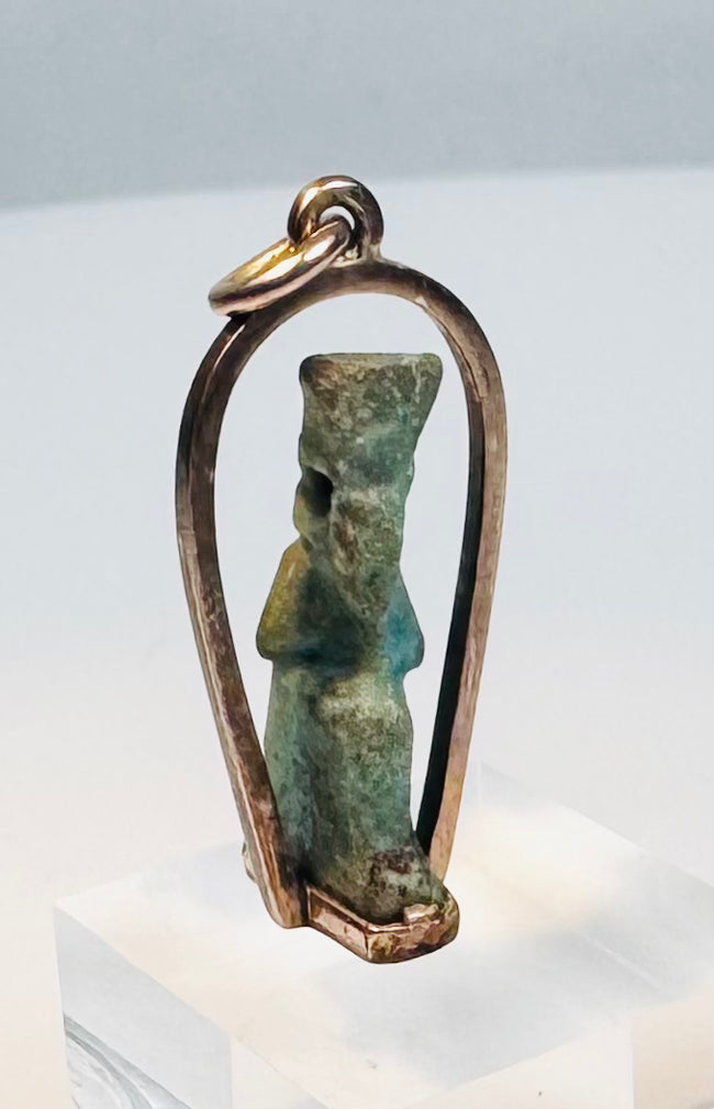Late Period Egyptian faience amulet depicting a stylized standing divine figure