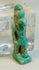 Ancient Egyptian blue-green faience falcon-headed amulet of Horus with burial patina