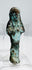 Late Period Egyptian funerary ushabti with crossed arms and headdress