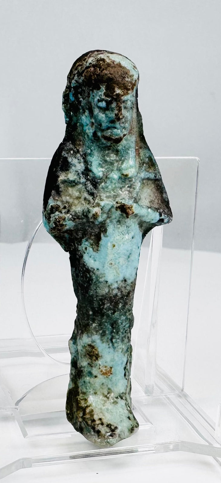 Late Period Egyptian funerary ushabti with crossed arms and headdress