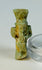 Ancient Egyptian protective Bes charm in glazed faience mounted on display stand.
