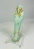 Slight left view of turquoise-blue Egyptian ushabti showing detailed mummiform body and carved inscriptions.