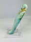 Left side of ancient Egyptian faience ushabti figure with blue-green glaze and visible hieroglyphic column.