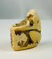 Ancient Egyptian baboon-form ritual vessel carved from limestone, sacred to the god Thoth