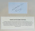 Handwritten inscription above an identification panel describing the history of the attributed Egyptian mummy wrappings.
