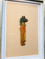 Ancient Egyptian funerary fragment showing Anubis in profile with painted details