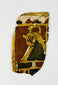 Egyptian coffin fragments with red, ochre, and black painted decoration