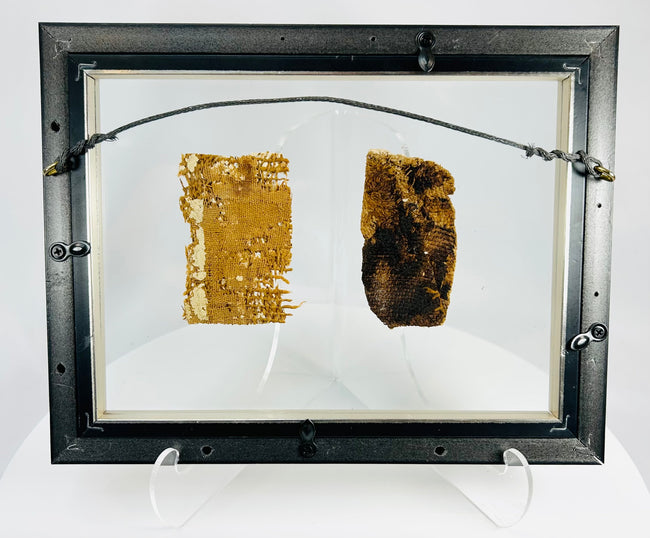 Ancient Egyptian burial fragments with classic profile figure and pigment traces