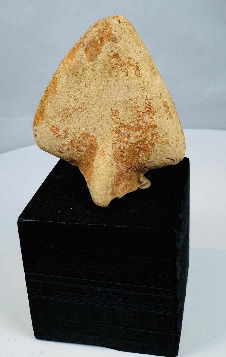 Ancient terracotta sacred cobra with raised headpiece and archaeological patina