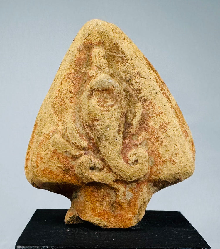 Molded terracotta uraeus fragment depicting a rearing sacred cobra