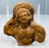 Ancient Egyptian Ptolemaic terracotta fragment, circa 200–100 BCE, preserving the face and upper torso of a female figure.