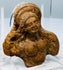 Egyptian terracotta votive fragment from the 2nd century BCE, reflecting a blend of Hellenistic and Egyptian artistic traditions.