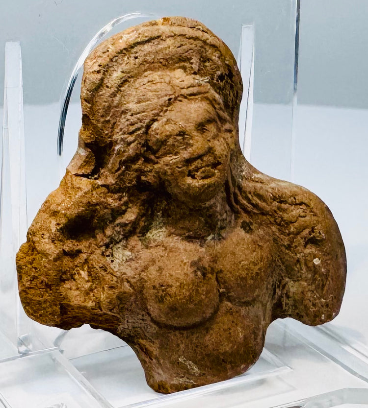 Egyptian terracotta votive fragment from the 2nd century BCE, reflecting a blend of Hellenistic and Egyptian artistic traditions.