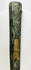 Vertical view of upper Etruscan bronze sword sheath with intricate carvings, gemstone inlay, and bronze patina – early Iron Age artifact