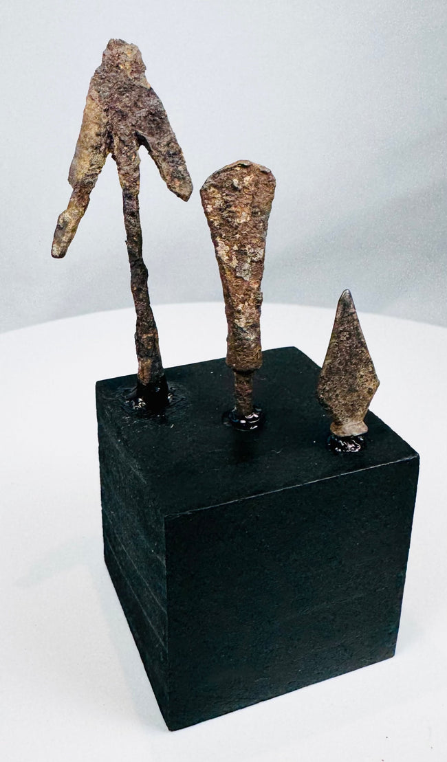 Ancient European iron arrowhead with narrow lozenge-shaped blade and pointed tip