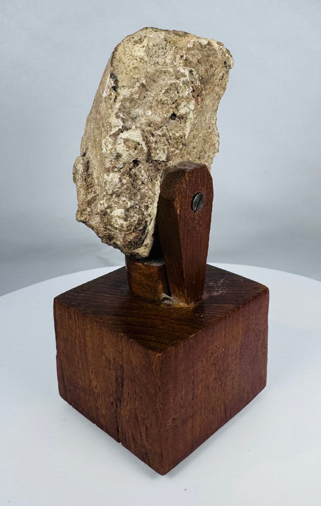 Weathered stucco head from ancient Gandhara with mineral deposits and age-related wear