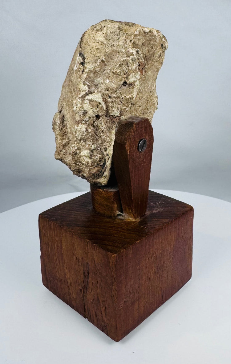Weathered stucco head from ancient Gandhara with mineral deposits and age-related wear