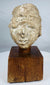 Gandhara region Buddhist head sculpture fragment with serene facial expression