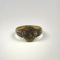 Historic gold-gilded bronze ring dating to circa 300–600 CE with engraved botanical decoration