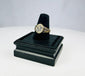 Late Roman to Early Byzantine gold-gilded bronze ring with engraved floral bezel, circa 300–600 CE