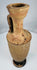 Ancient Greek vessel with concentric dark bands around the foot